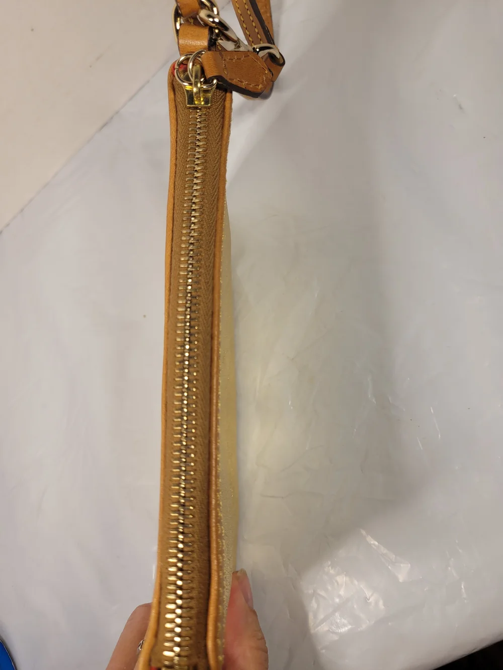 Dooney & Bourke Metallic Gold Leather Wristlet with Tan Trim